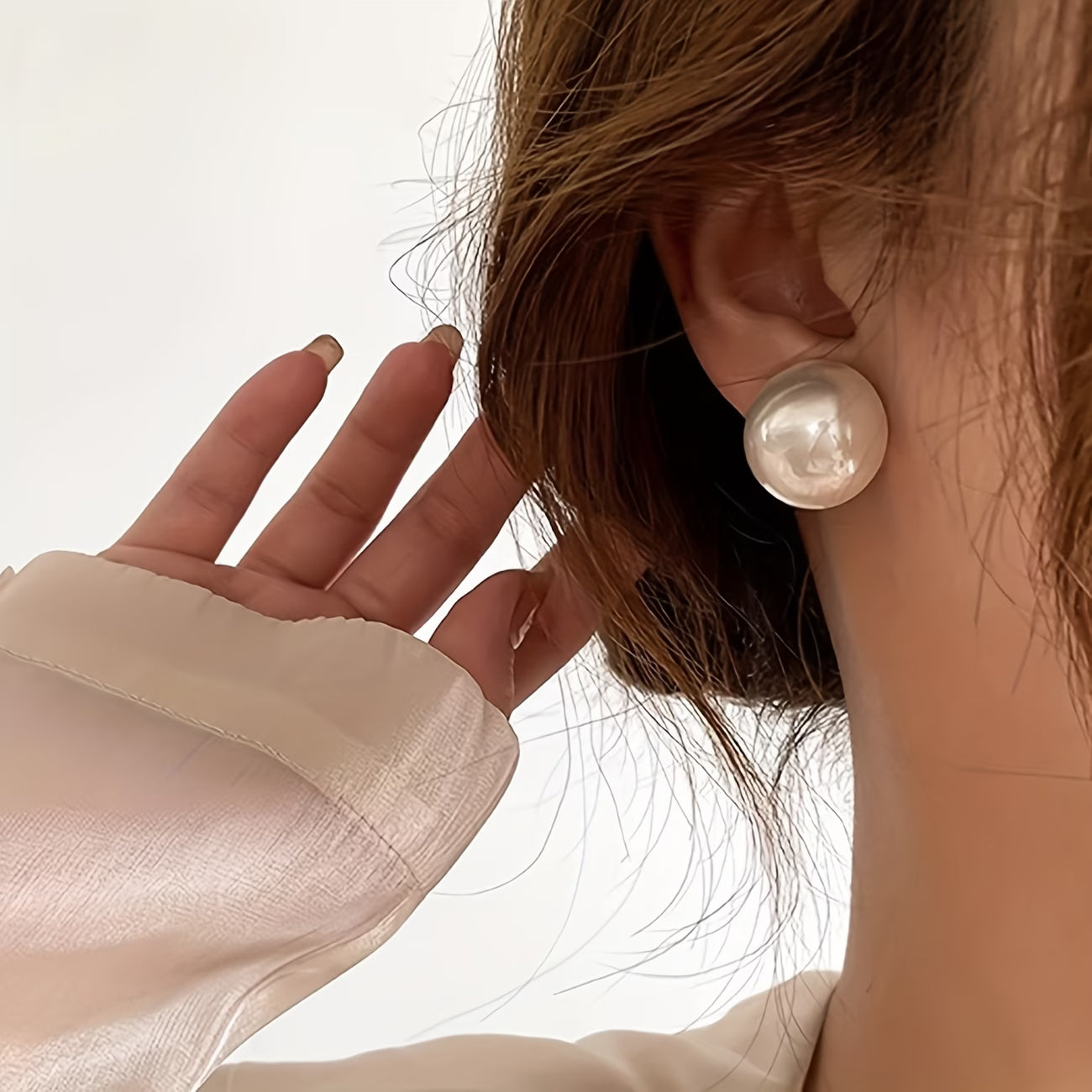 Los Pendientes a Perno con Perla Statement