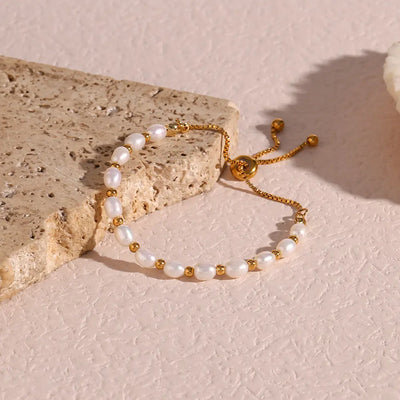 Elegante Pulsera de Perlas y Oro