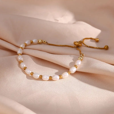 Elegante Pulsera de Perlas y Oro